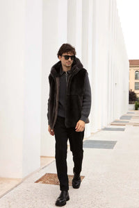 Short mens mink vest with hood made of soft  beaver fur, cashmere and tech-fabric. Reversible. Padded and quilted. Zip fastening