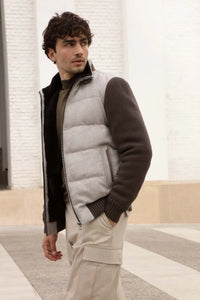Mens puffer jacket with fur inside made of cashmere, padded and quilted. Beaver lining. Zip fastening.  Knitted sleeves and hem