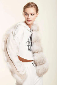 Collarless fur vest in soft fox fur natural amber color for a very young and easy look.