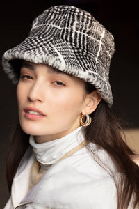 Sheared grey mink hat with Printed black lines. Very trendy and glamorous
