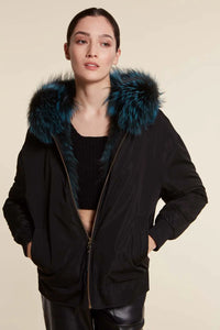 Reversible blue fox fur jacket womens with hood and zip fastening. Black nylon inserts on the cuffs and hem. Very young 