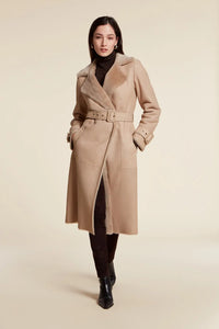 Long shearling coat womens, style trench coat made of beige leather with matching shearling lining. Fitted line. Belt fastening