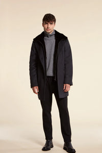 Mens cashmere coat with mink. Wide lapels and long set-in sleeves. Button closure. Fur collar and detachable front with zip 