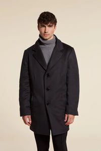 Mens cashmere coat with mink. Wide lapels and long set-in sleeves. Button closure. Fur collar and detachable front with zip 