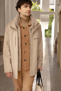 Short mens mink collar coat made of cashmere fabric. Mink fur in the collar and on the front. Suede inserts. Padded and quilted 