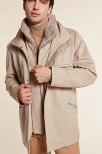 Short mens mink collar coat made of cashmere fabric. Mink fur in the collar and on the front. Suede inserts. Padded and quilted 