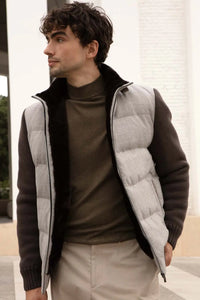 Mens puffer jacket with fur inside made of cashmere, padded and quilted. Beaver lining. Zip fastening.  Knitted sleeves and hem