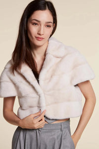 Short mink jacket women with wide lapel collar and short sleeves. Closure with fur hooks. Very soft and captivating