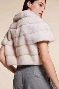 Short mink jacket women with wide lapel collar and short sleeves. Closure with fur hooks. Very soft and captivating