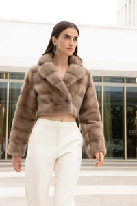 Short mink jacket womens with wide lapel collar, 2 front buttons, belt with loops both on the body hem and on the sleeves