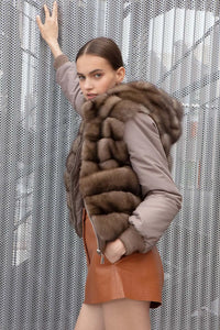 Reversible russian sable fur jacket with hood and dropped sleeves, wool cuffs and hem. Zip fastening. Pockets with zip
