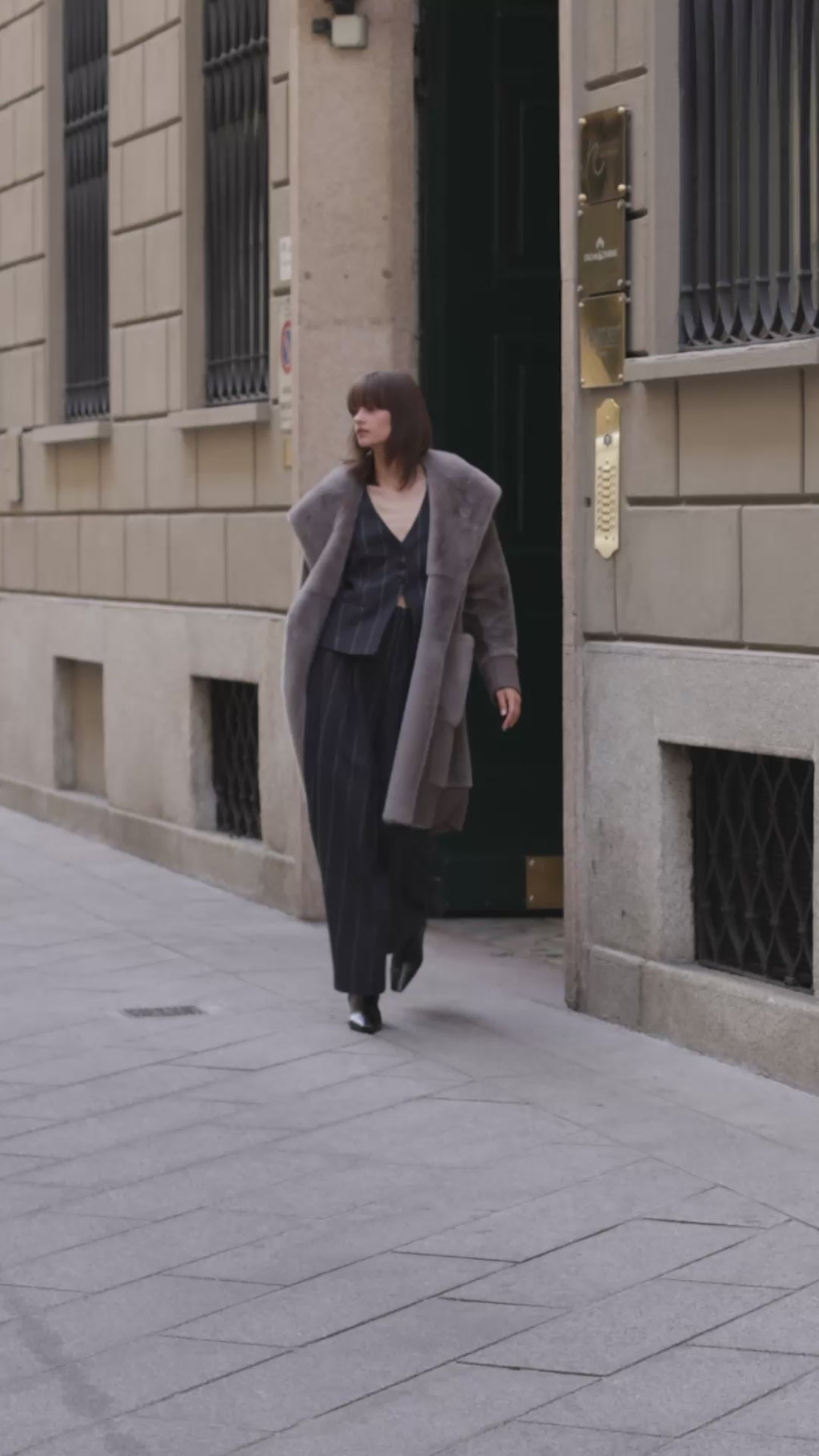 Long shearling coat womens in grey hue with inner hoof and trimming in scandinavian mink fur
