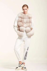 Collarless fur vest in soft fox fur natural amber color for a very young and easy look.